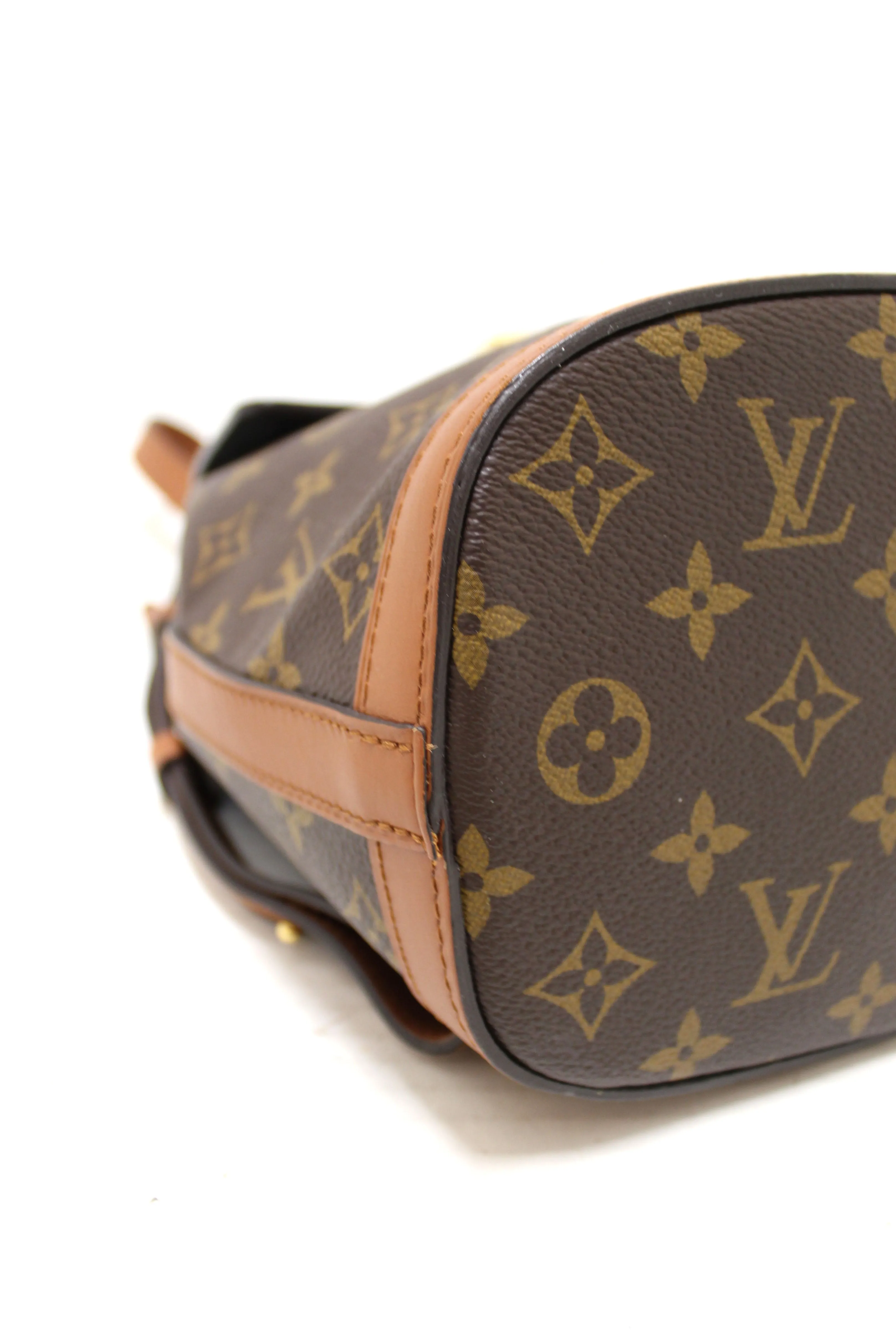Authentic Louis Vuitton Reverse Monogram Dauphine Backpack PM