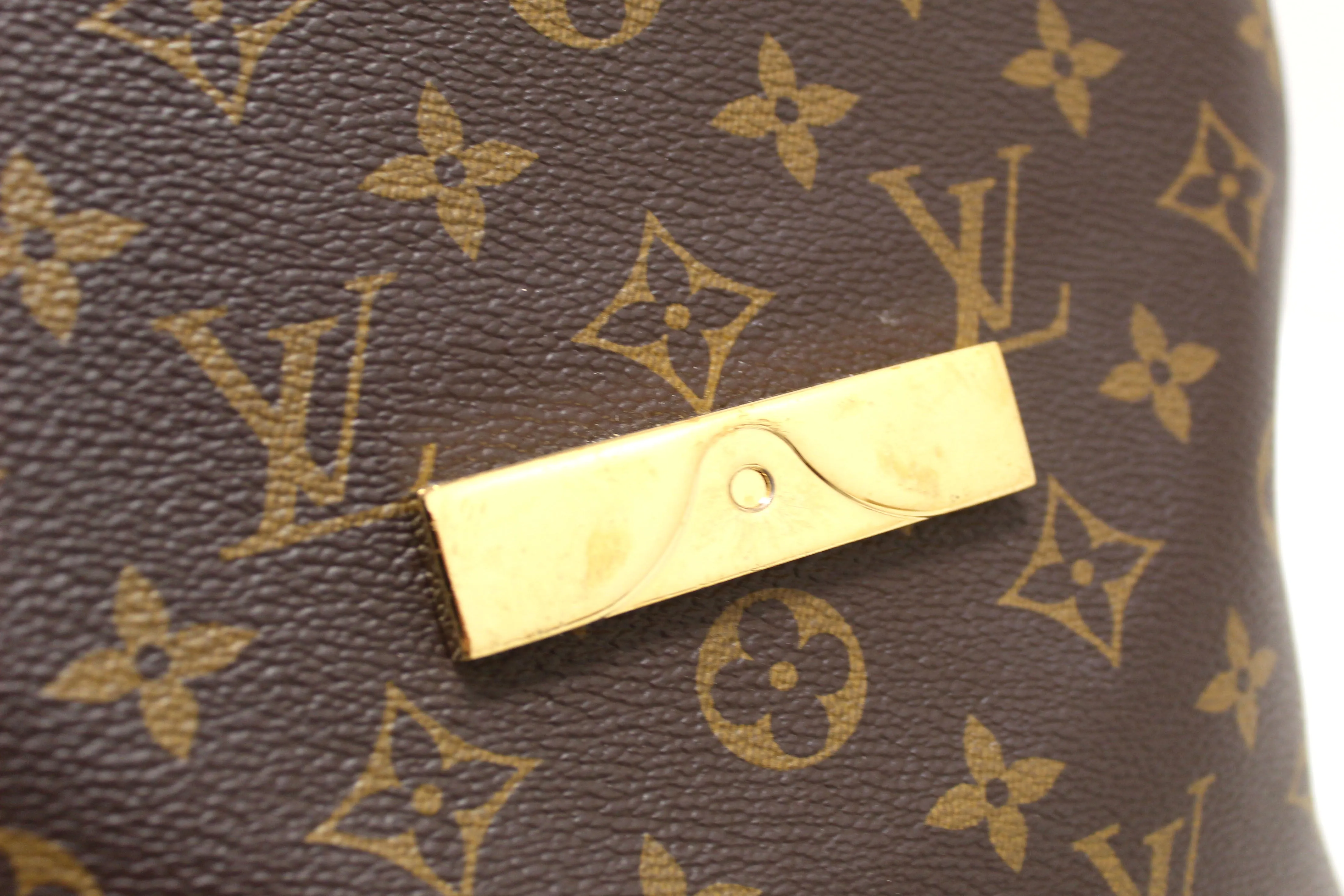 Authentic Louis Vuitton Reverse Monogram Dauphine Backpack PM